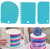 blue baking scrapers set with colorful cake