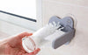 hand cleaning a glass using the glass cleaning brush 