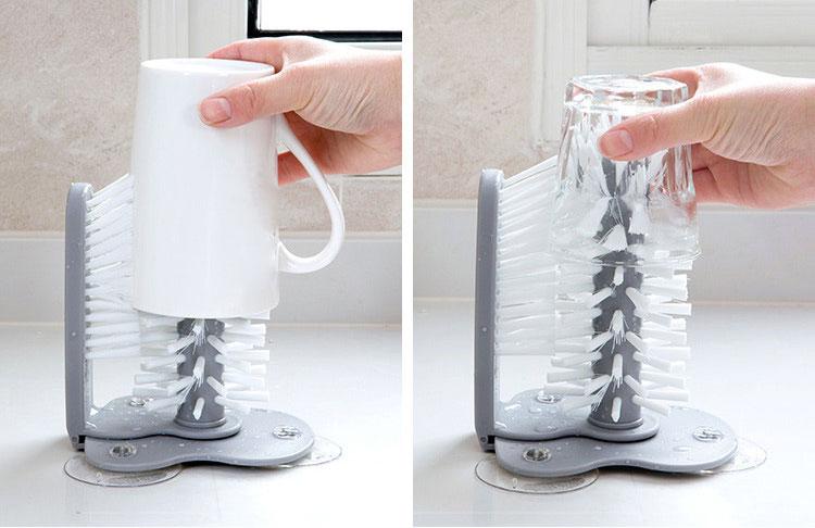 hand cleaning the glassware using the glass cleaning brush