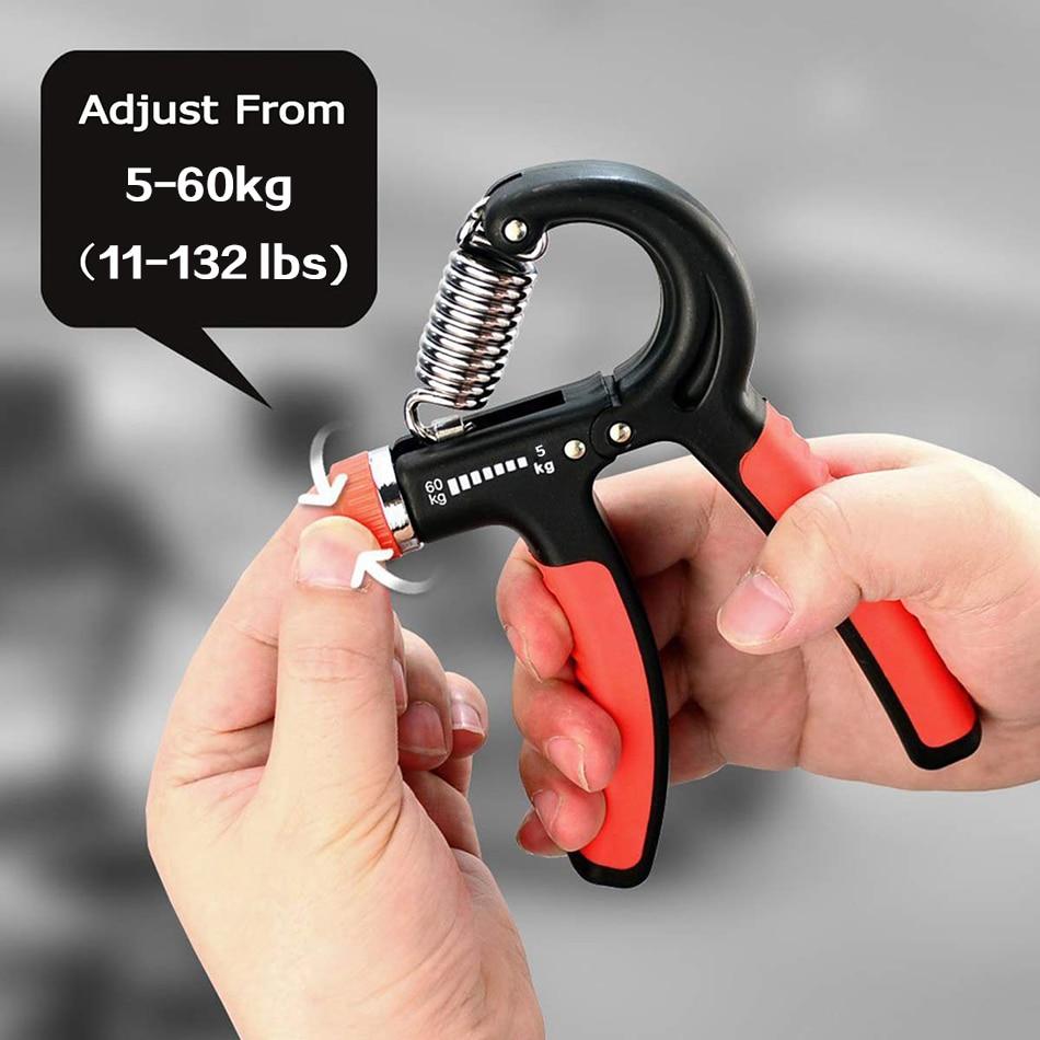 hand holding a handgrip exercise equipment and adjusting the rotary knob