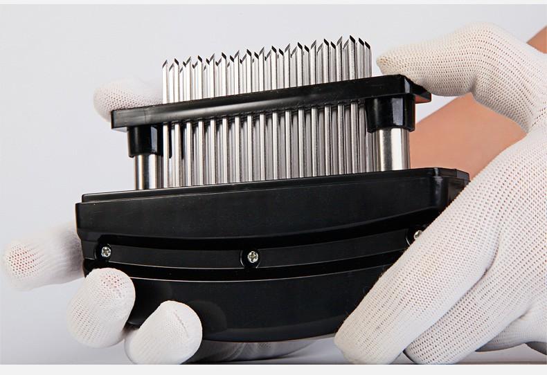 hand with gloves holding a meat tenderizer press