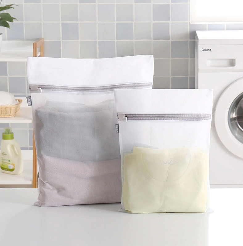 clothes inside a mesh laundry bag