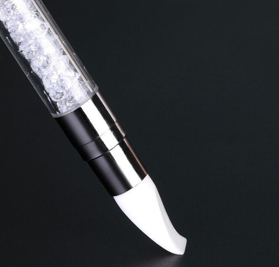 silicone nail pen with white crystals