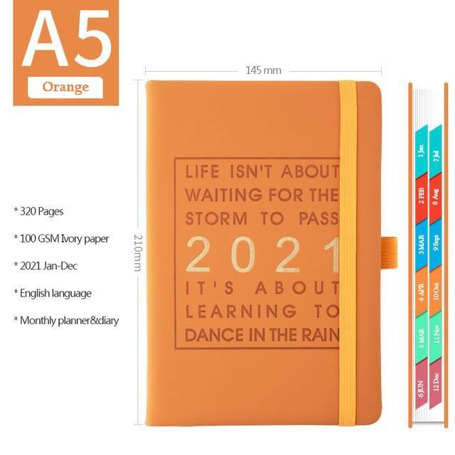 orange colored leather planner organizer