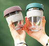 hands holding two coffee cups