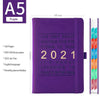 purple colored leather planner organizer