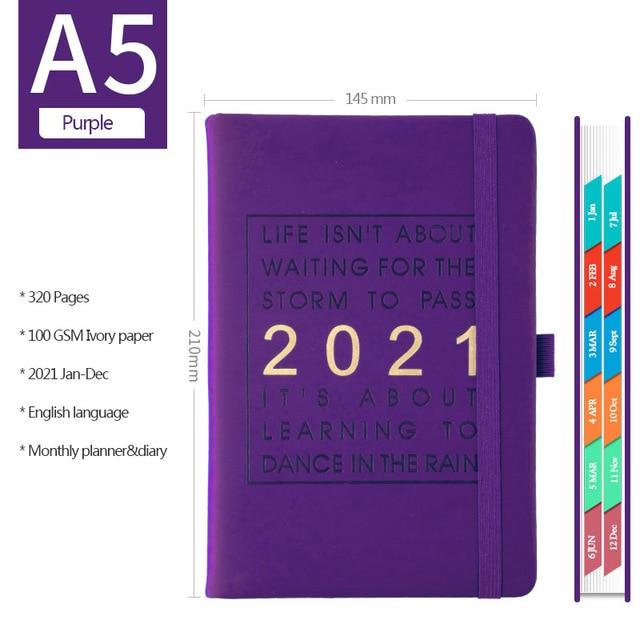 purple colored leather planner organizer