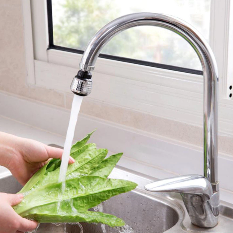 hand washing a vegetables on a kitchen sink