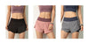 women models wearing running shorts colors black brown and gray